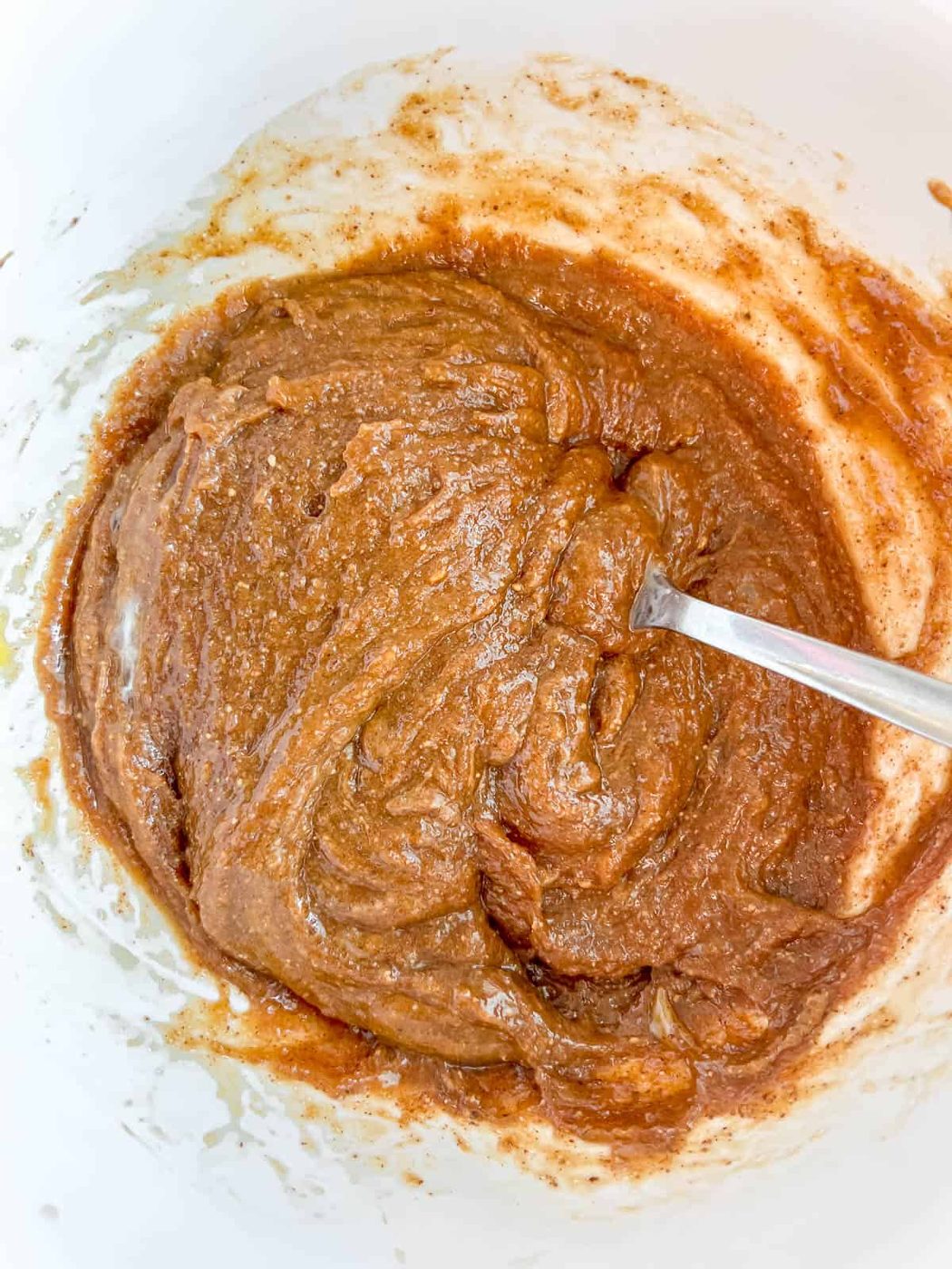 Wet ingredients for flourless monster cookies in a bowl.