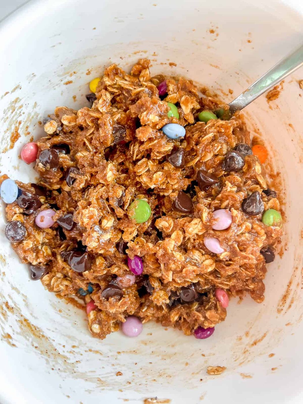 Chocolate cookies and chocolate chips added to monster cookie batter.