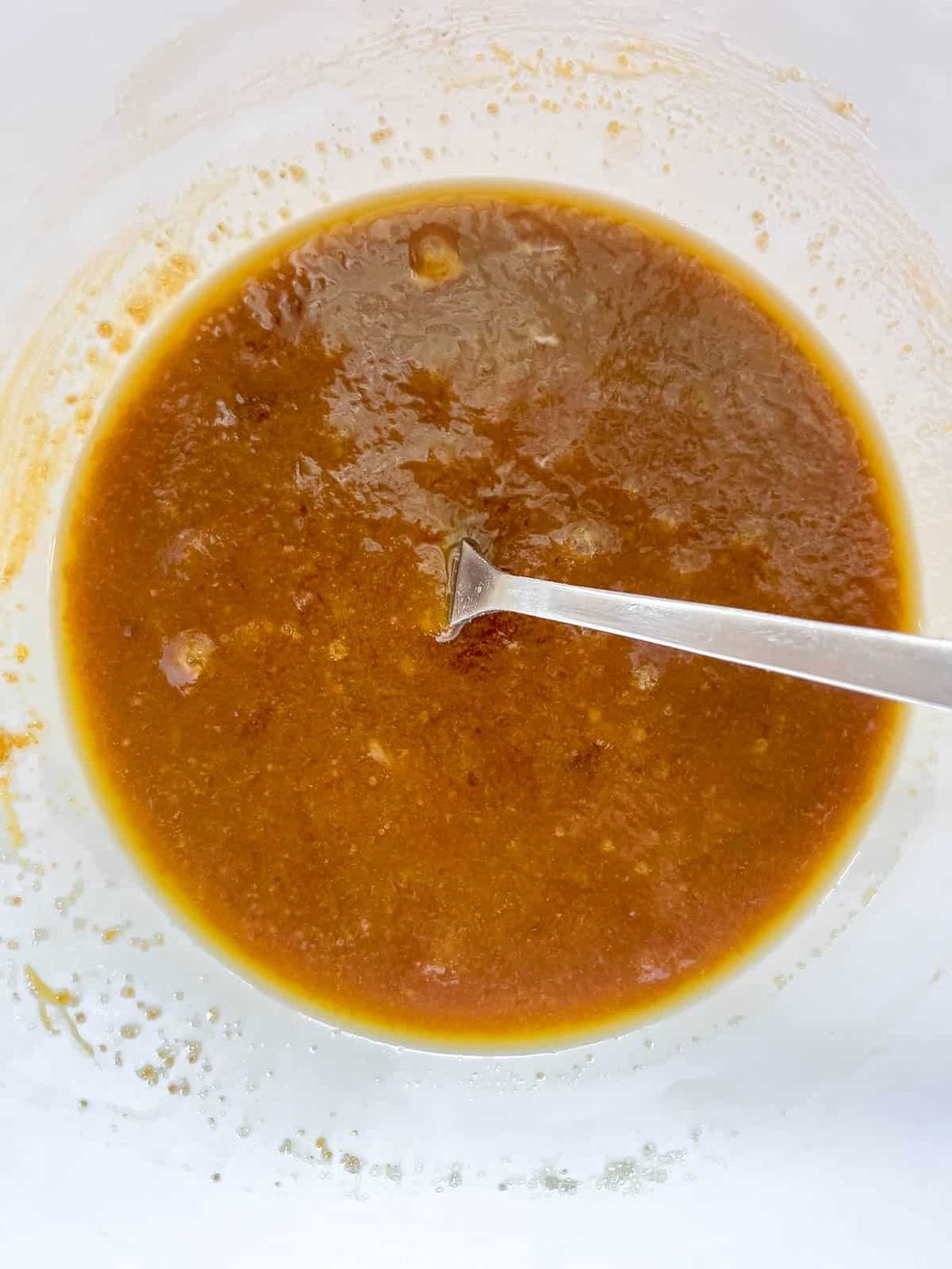 Wet ingredients in a bowl.