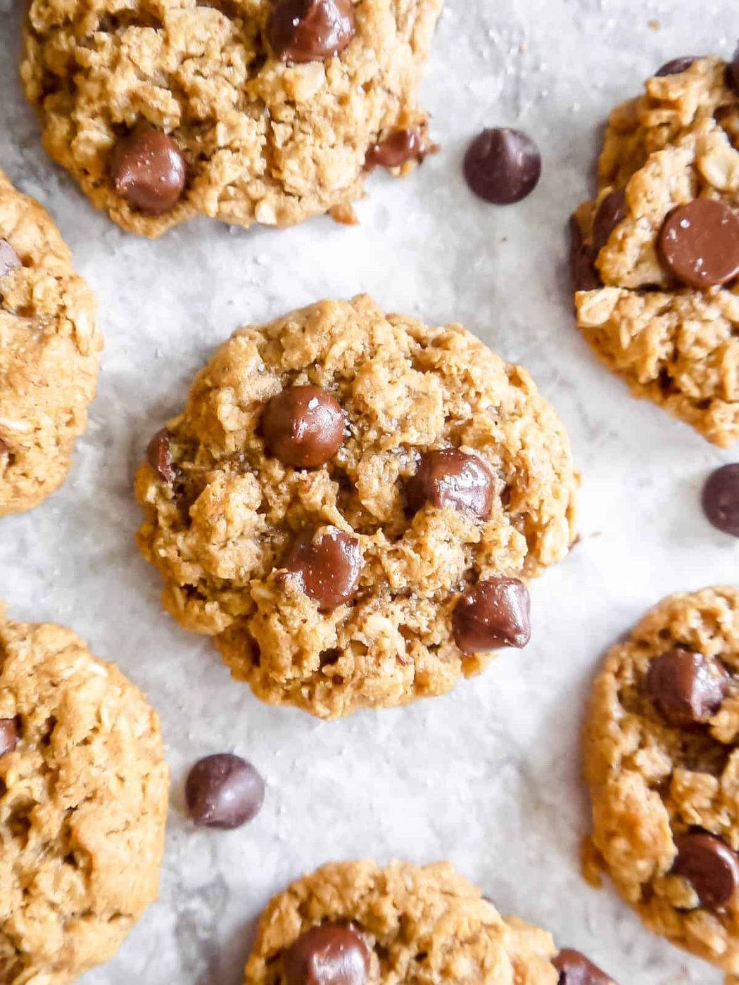 A bunch of almond flour oat cookies on a table.