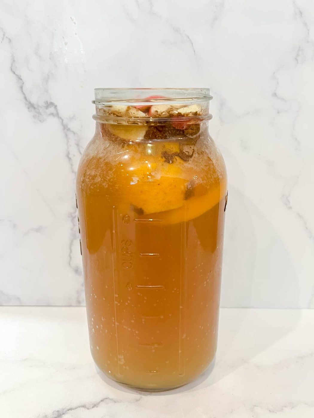 Thanksgiving Punch with alcohol after all the ingredients were added to the pitcher.
