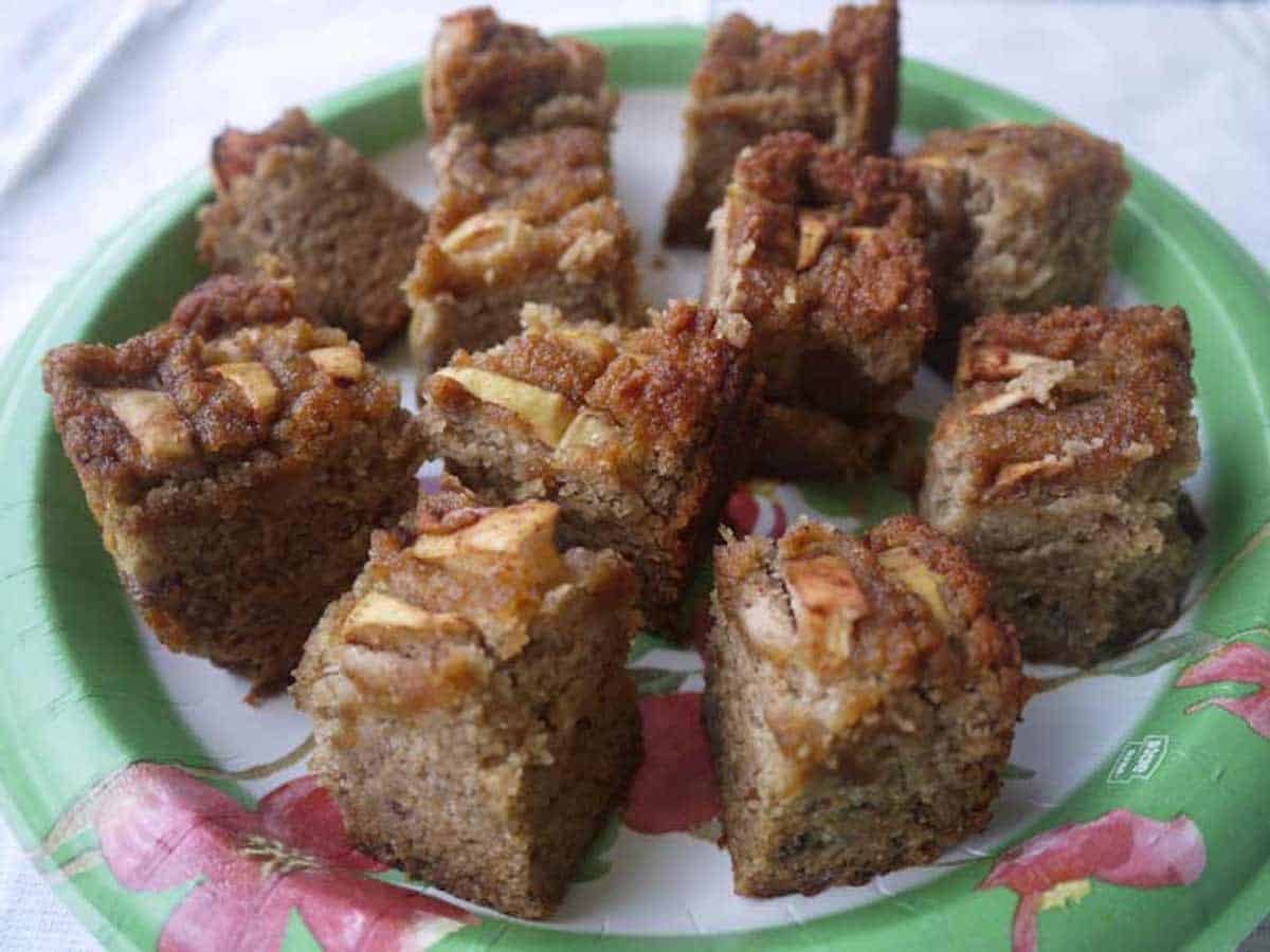 Paleo applesauce cake cut into pieces.