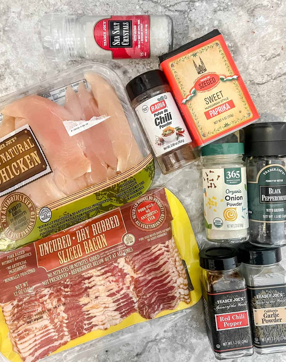 Ingredients needed to make bacon wrapped chicken tenders.