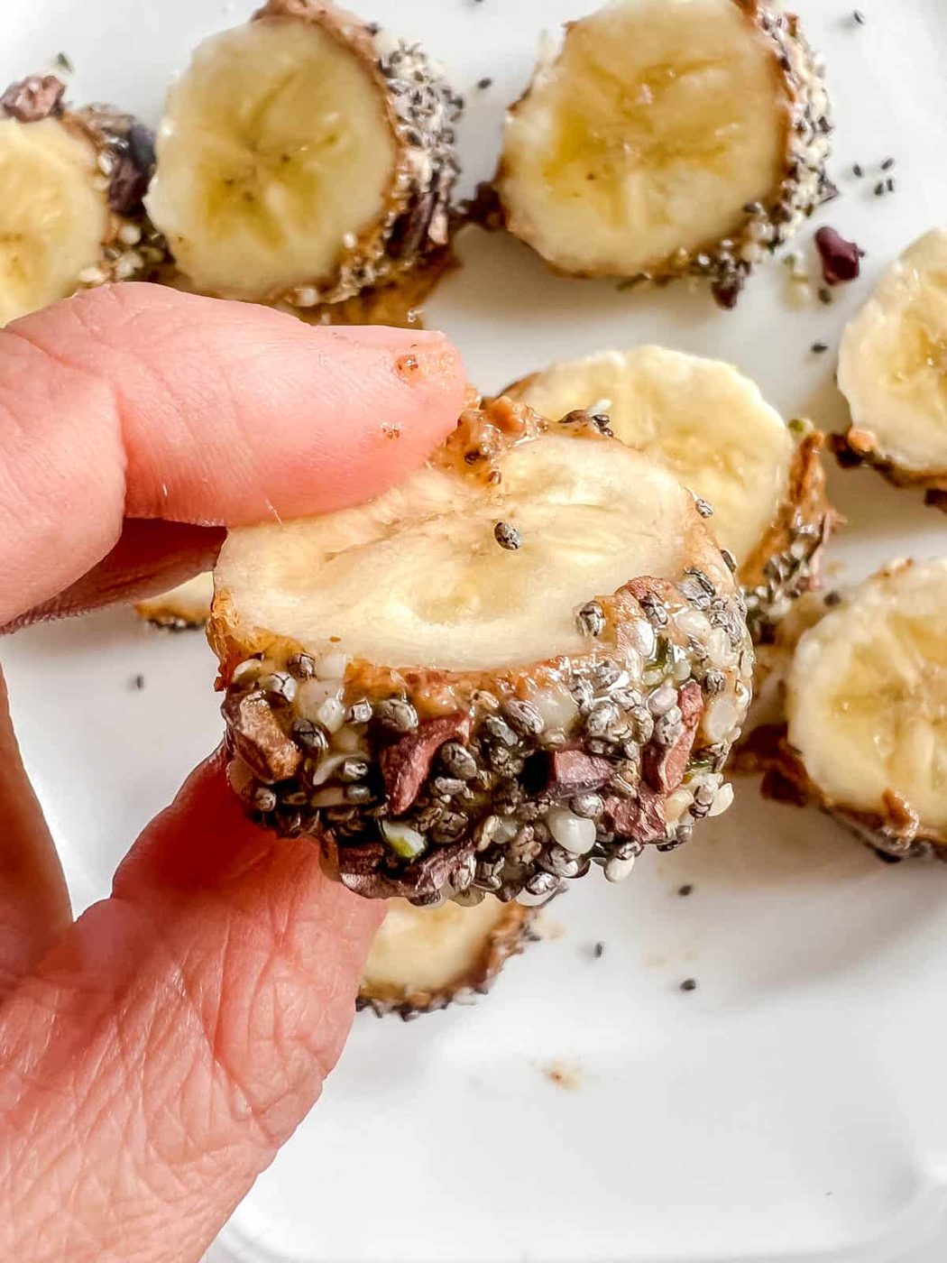 Breakfast sushi slice in between fingers.