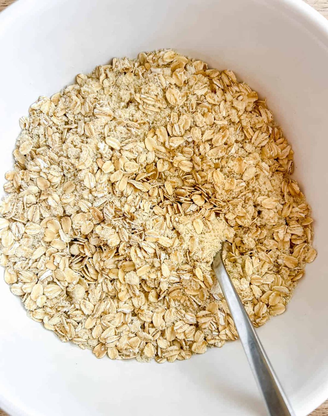 Dry ingredients for lighter banana oatmeal cookies in a bowl.