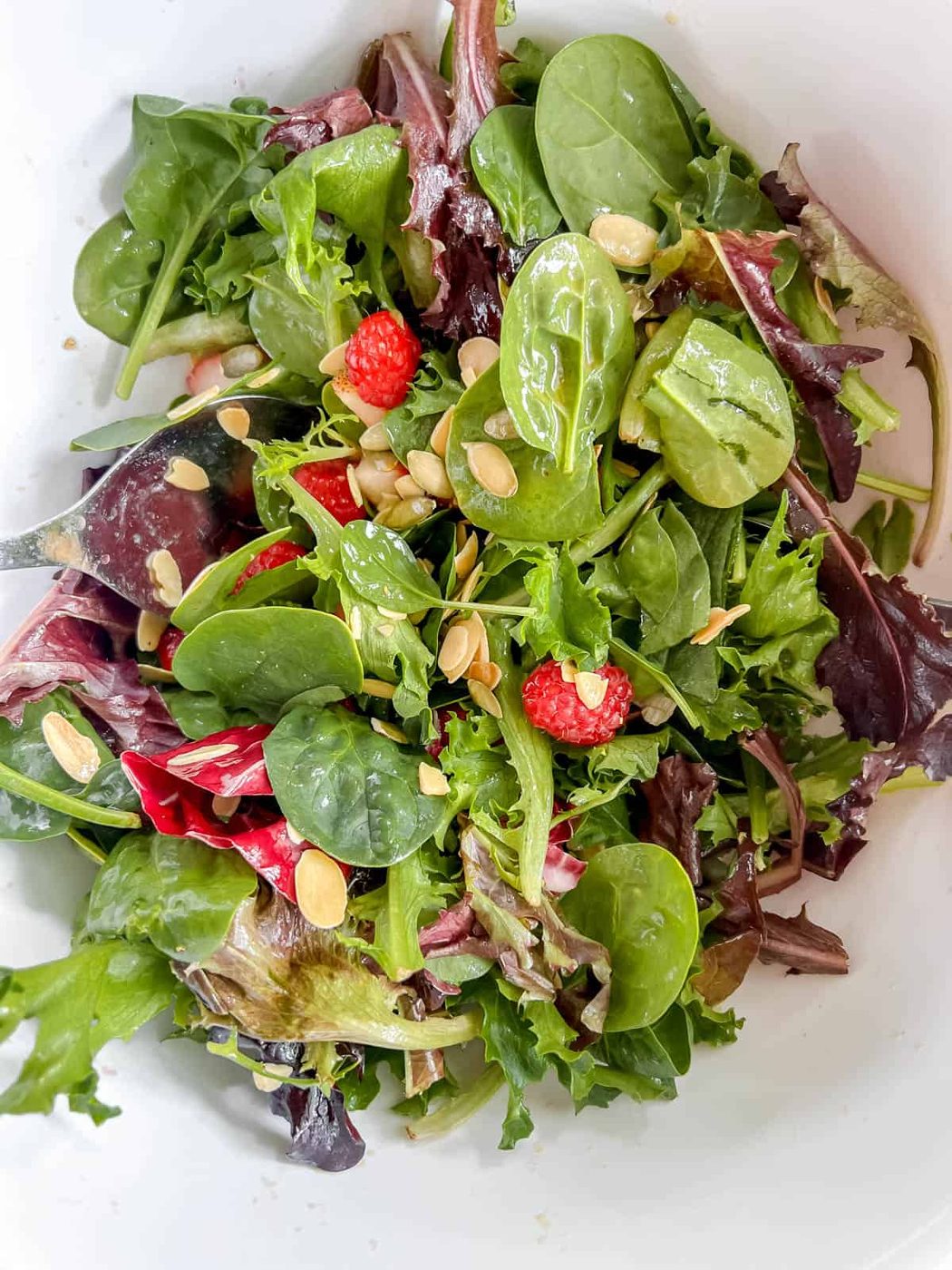 Salad mixed with the vanilla vinaigrette.