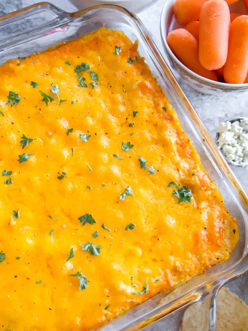 Frank's redhot buffalo chicken dip covered in cheese.