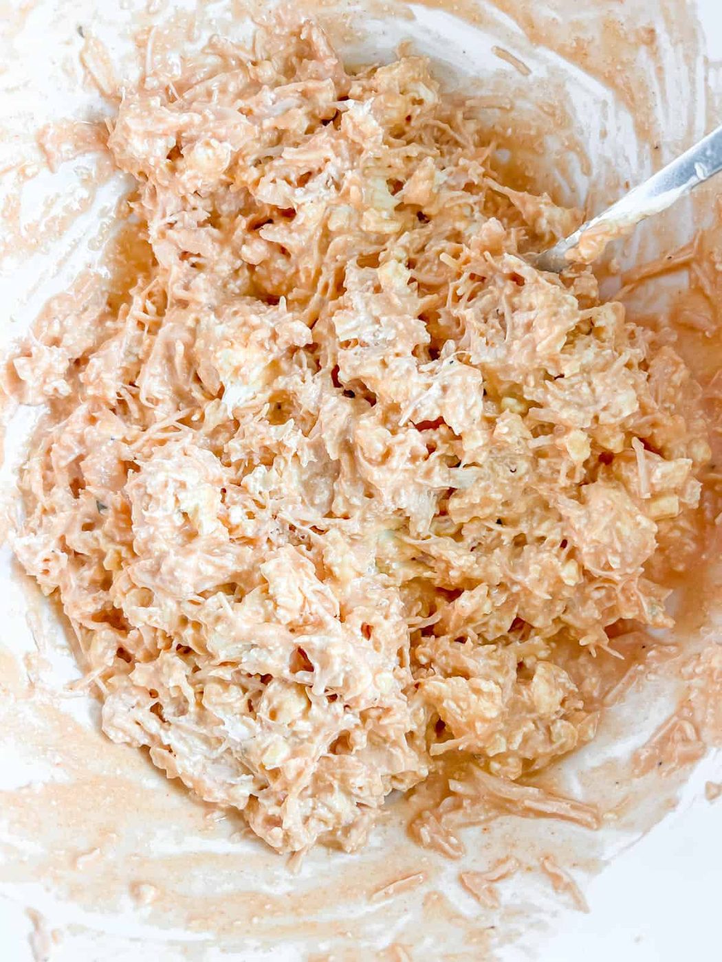 Buffalo dip mixed together.