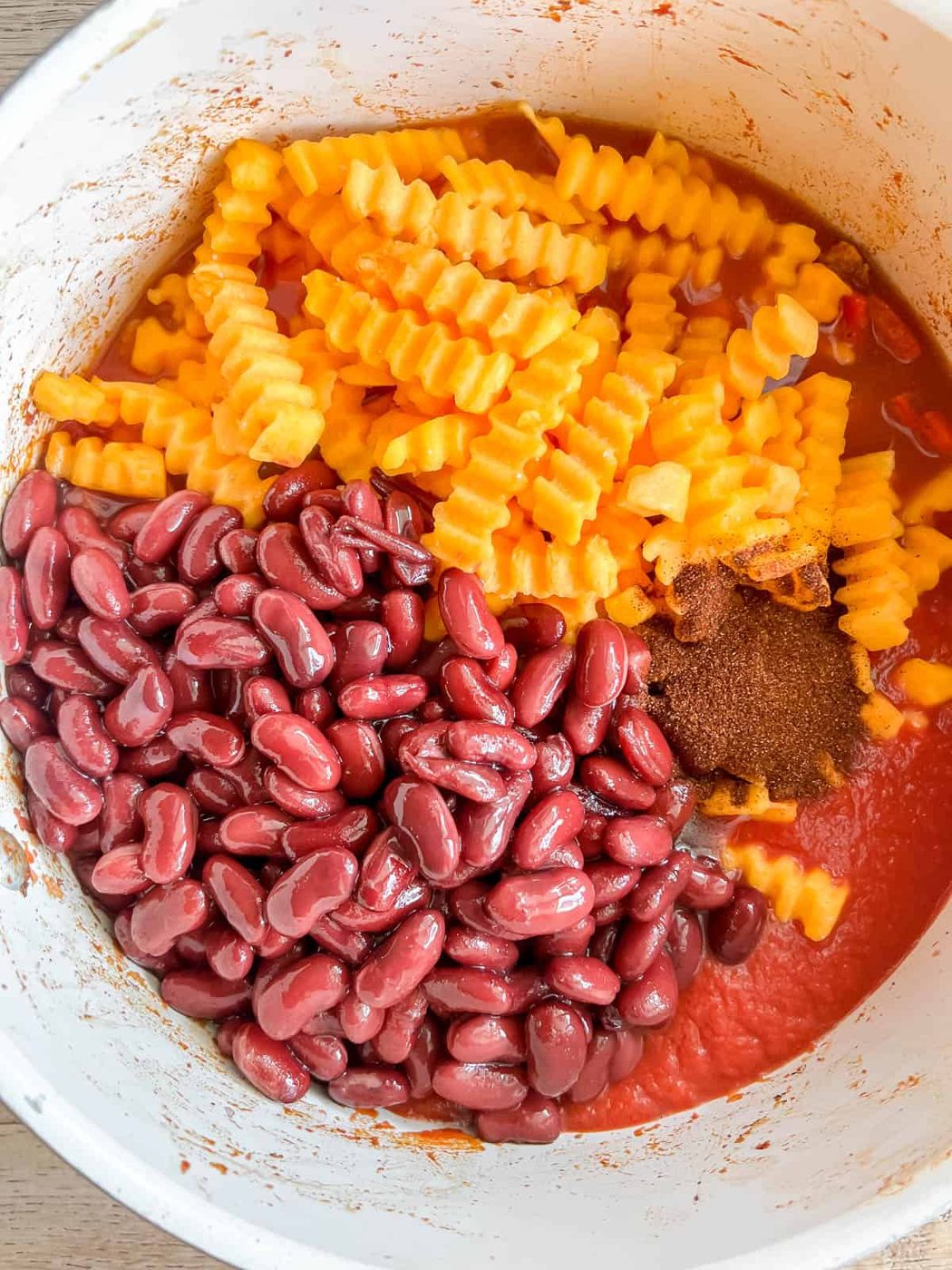 Beans and butternut squash added to the pan.