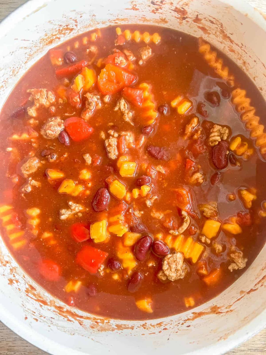 Tomato sauce added to the pan.