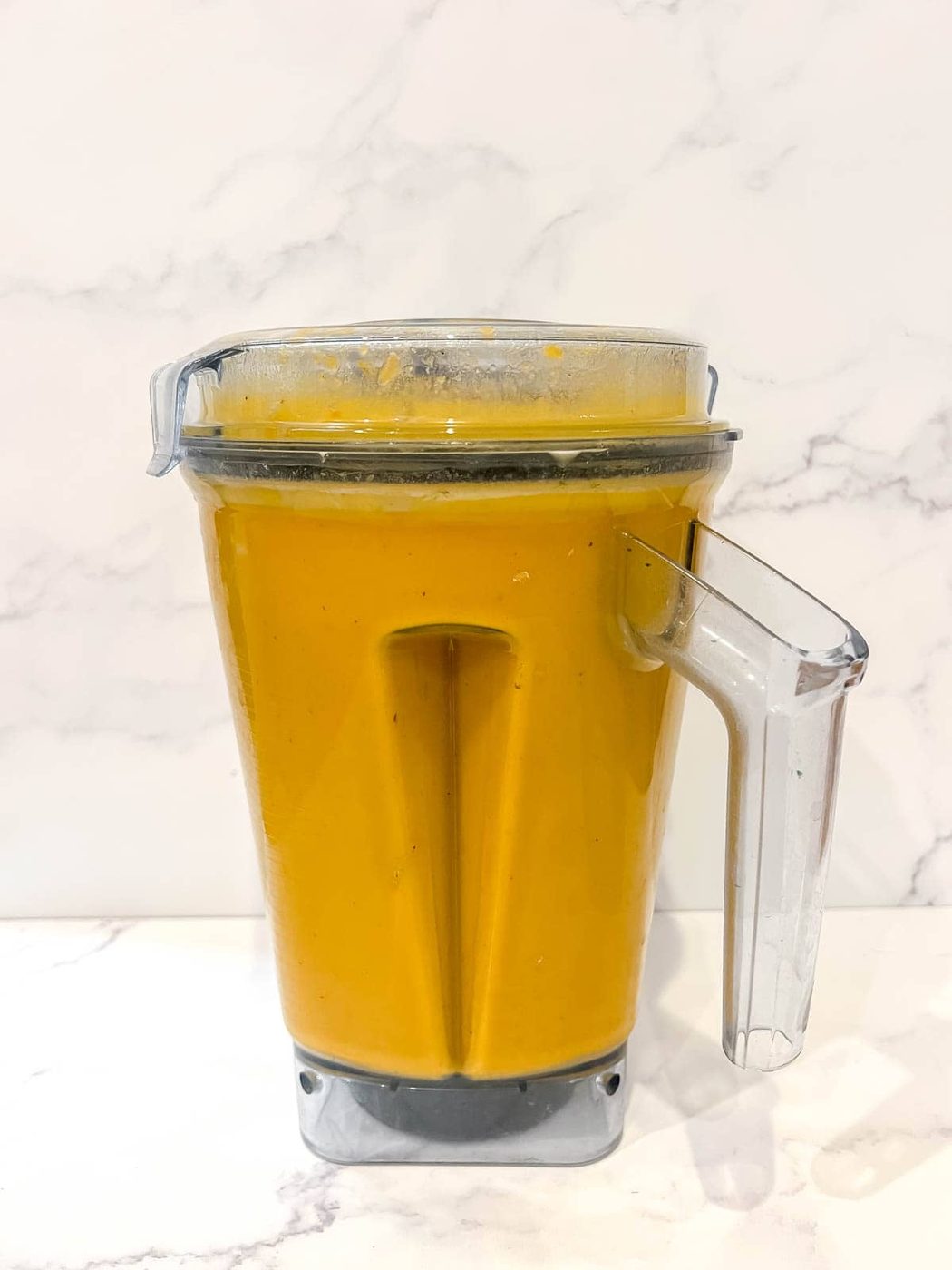 The soup in a blender after being mixed.