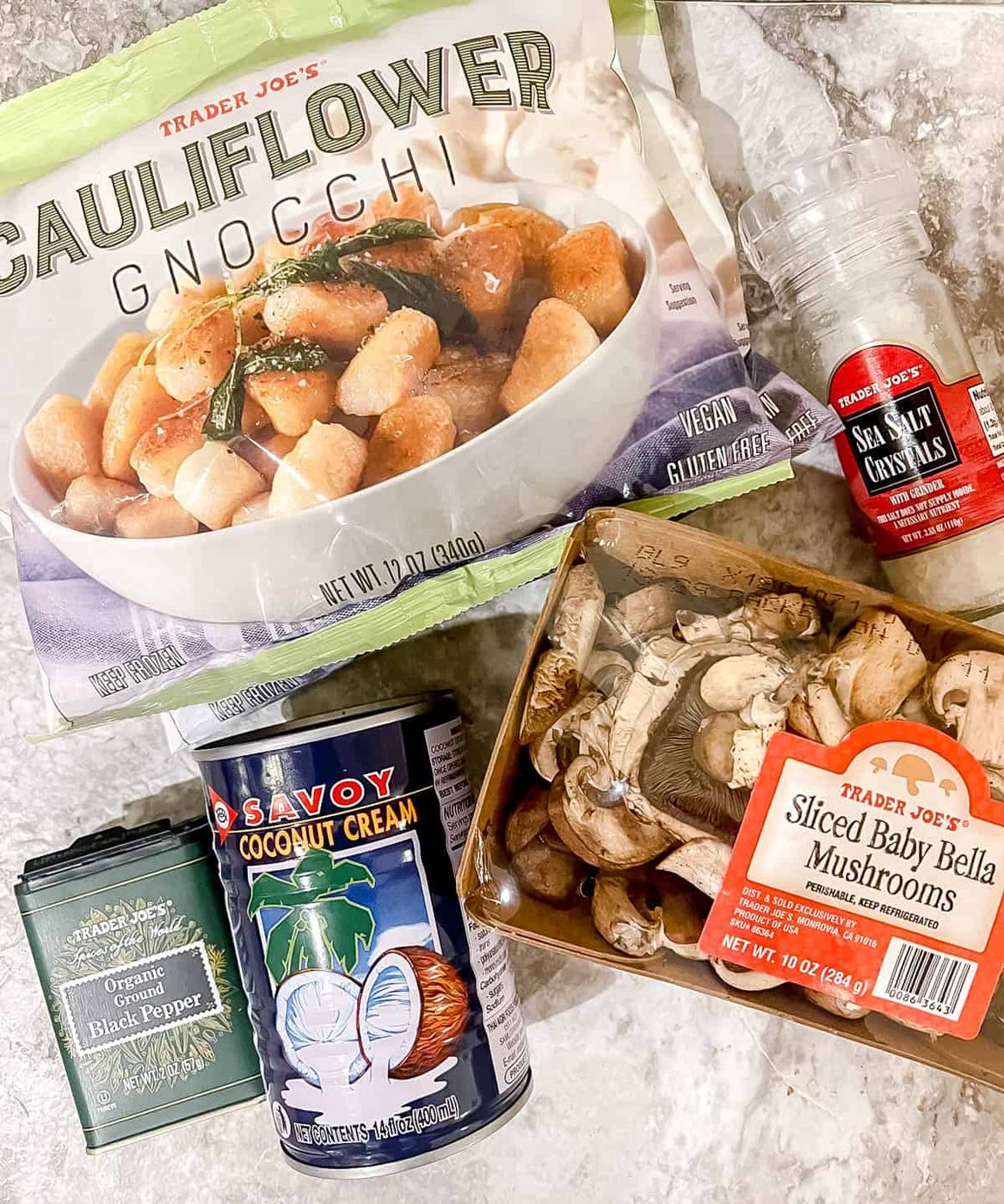 ingredients needed to make cauliflower gnocchi in coconut cream mushroom sauce.