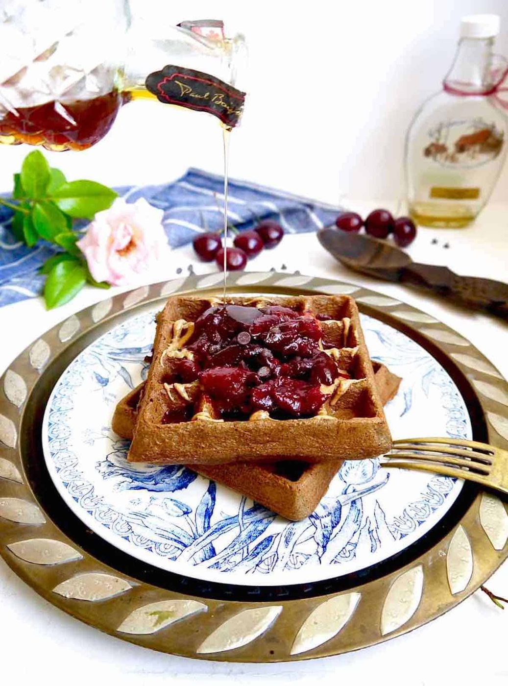 Paleo waffles with chocolate and cherries.