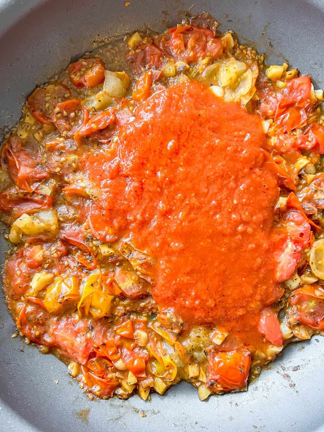 Marinara sauce added to the cherry tomato sauce.