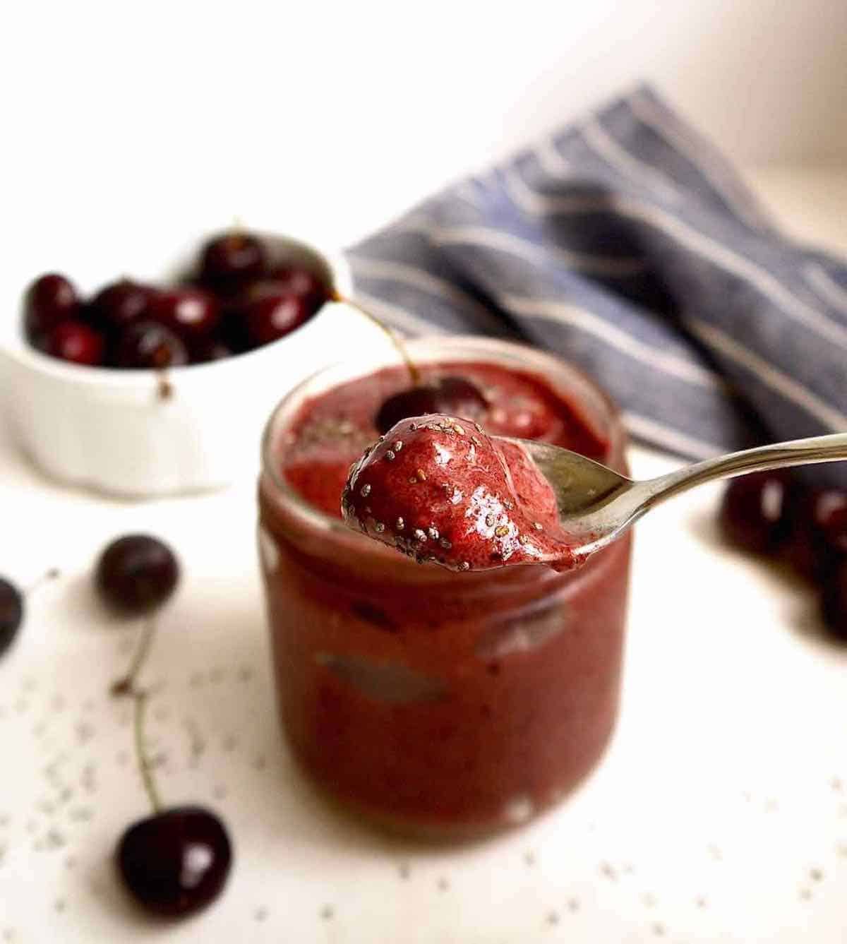 Cherry smoothie in a spoon.