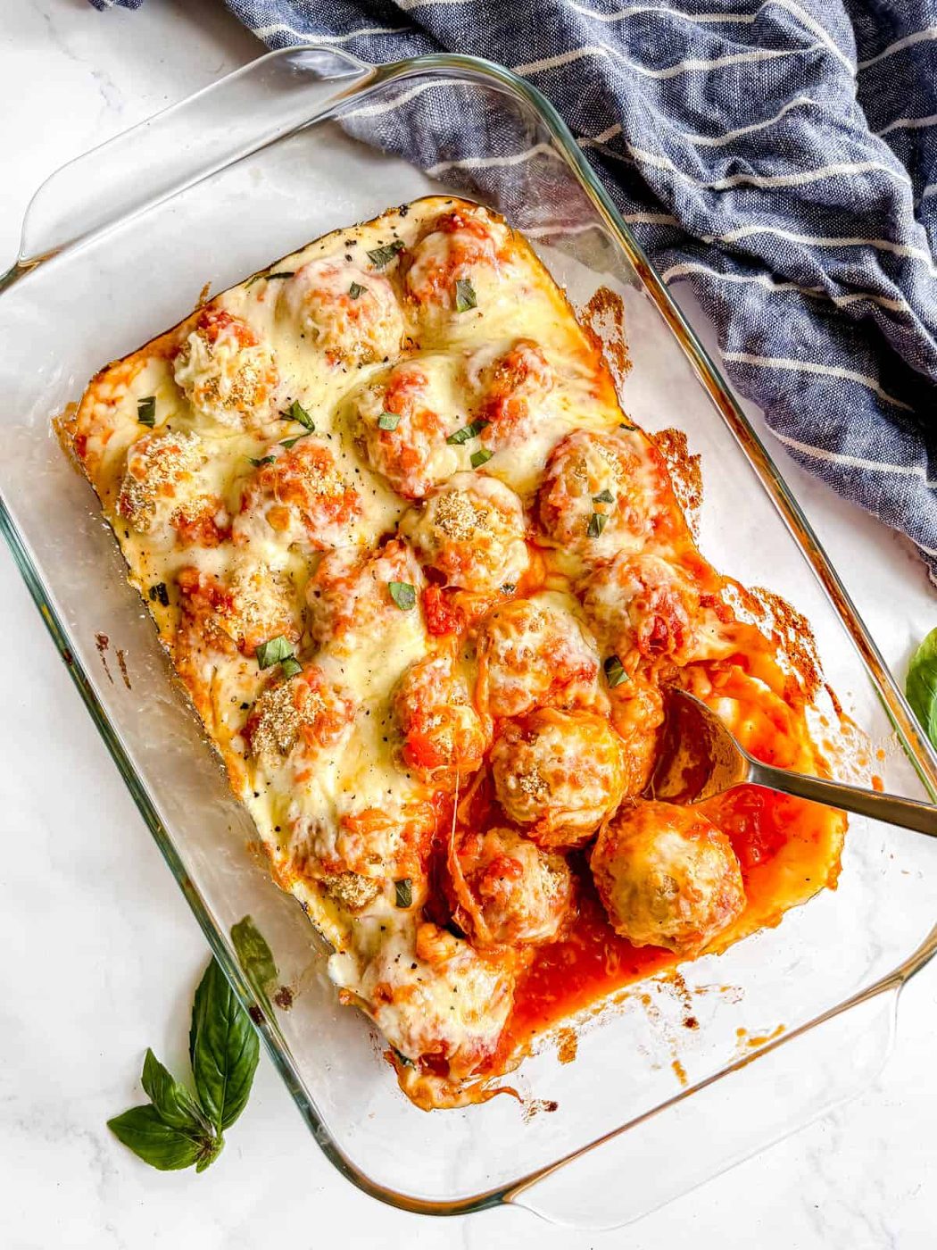 Chicken parmesan meatballs in a dish ready to be served.