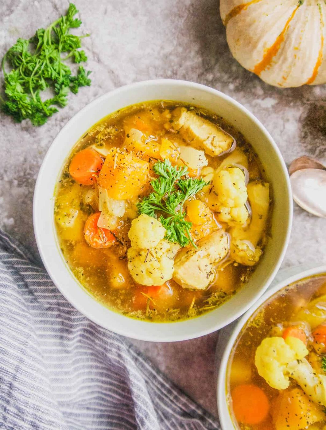 Cauliflower chicken soup in a bowl.