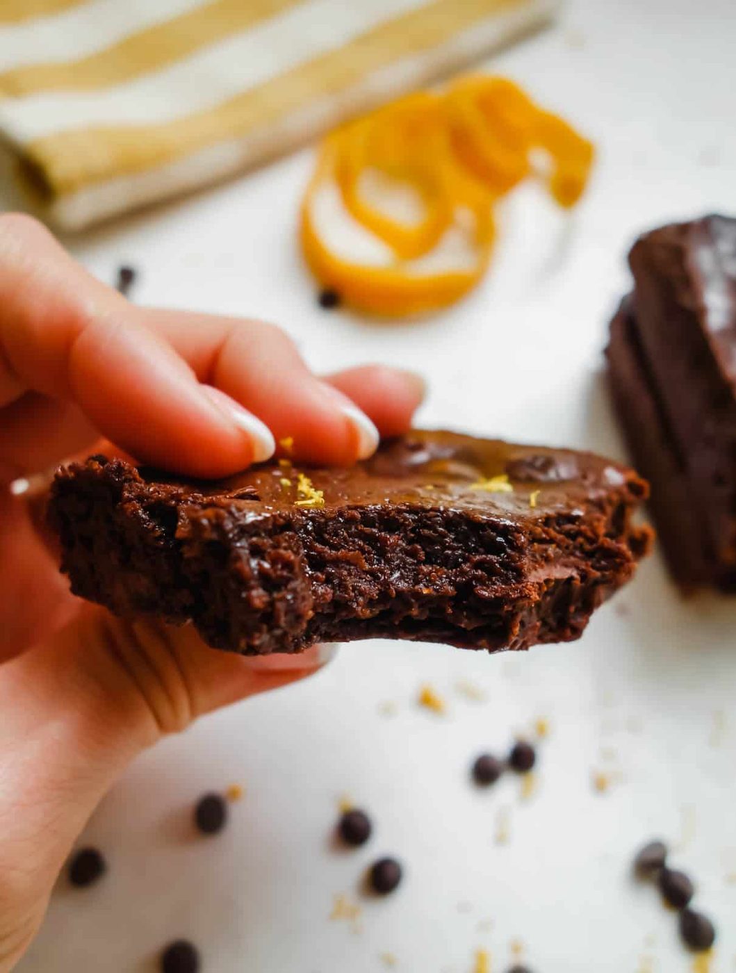 Aerial shot of bite taken out of brownies.