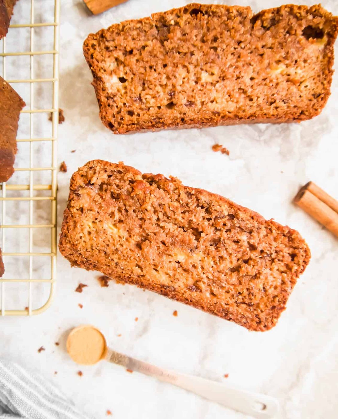Slices of gluten free dairy free banana bread on a table.