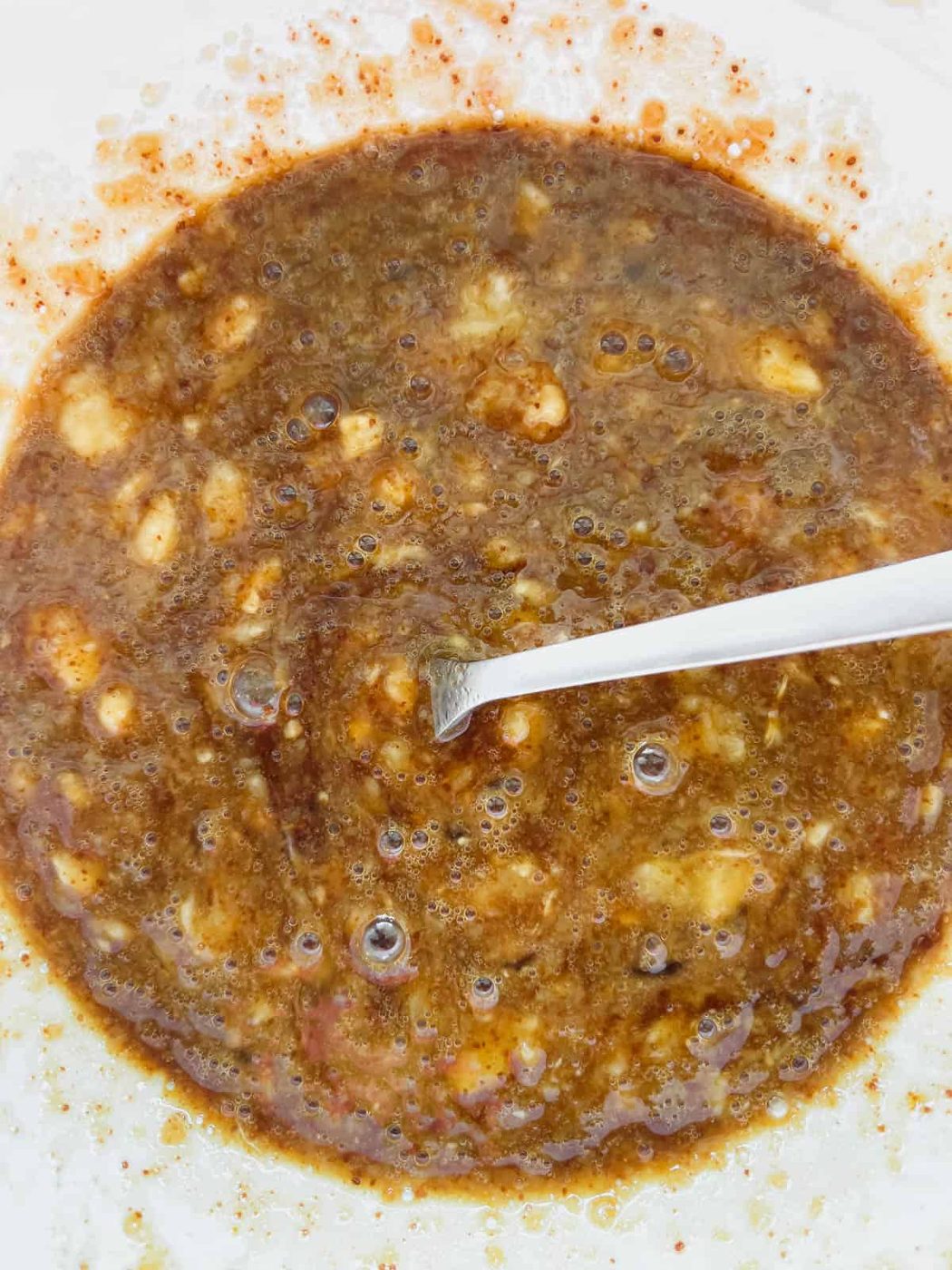 Wet ingredients mixed in a bowl.