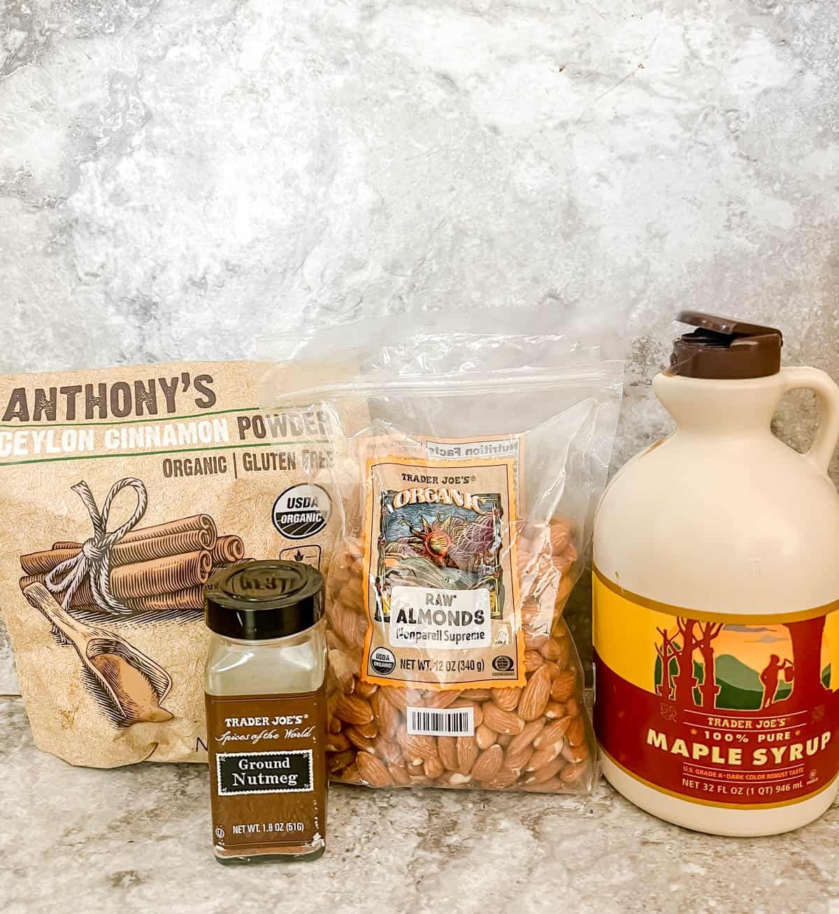 Ingredients needed to make cinnamon maple roasted almonds.