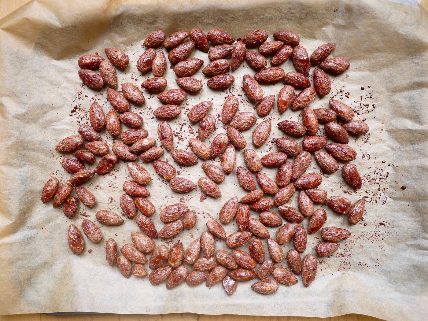 Maple almonds after baking, on a pan.
