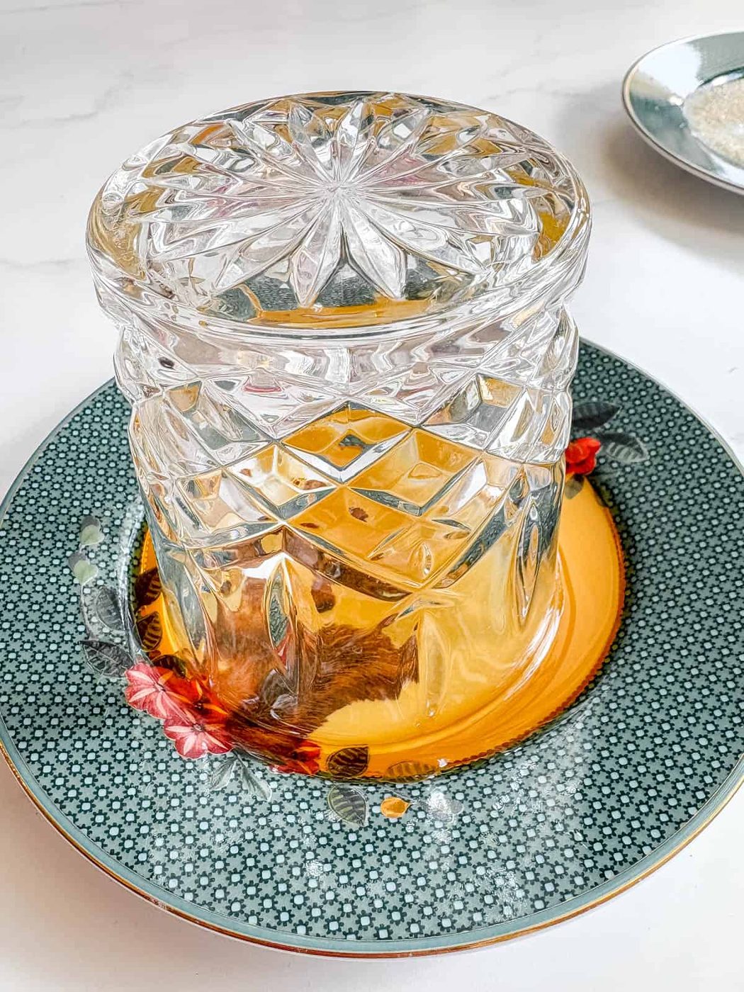 Cup rim dipped in maple syrup.