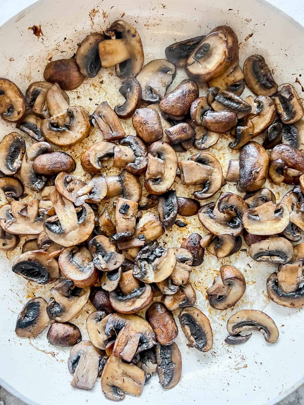 Mushrooms in a pan after cooking.