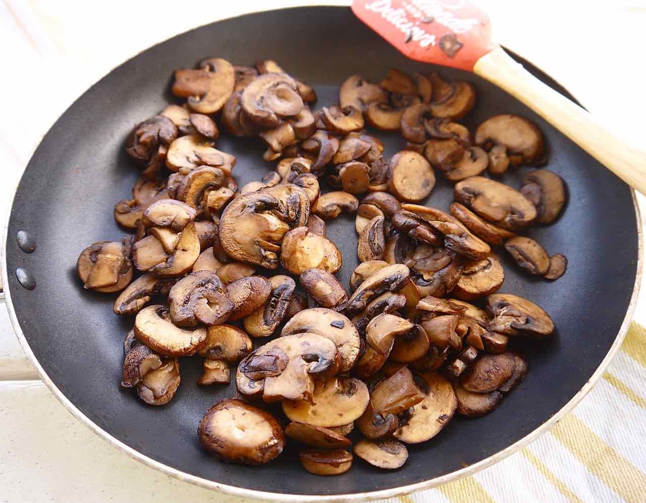 Browned mushrooms in a pan.