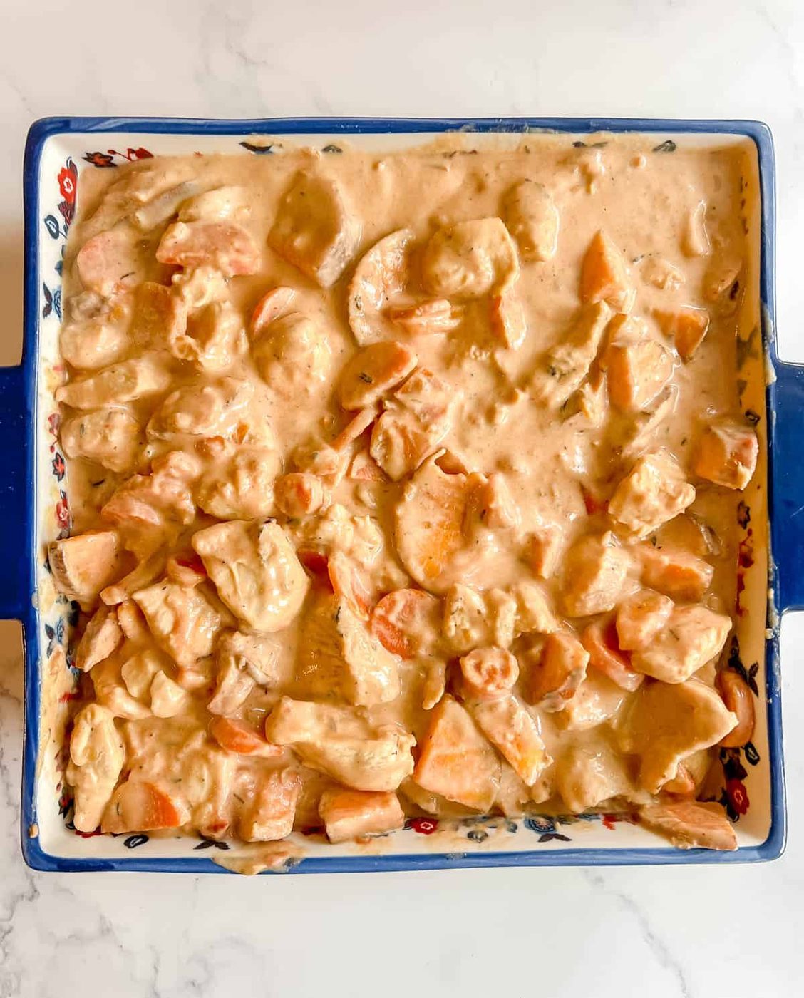 Chicken tomato casserole before cooking.