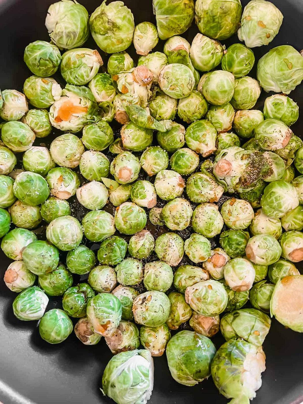Brussels sprouts in a frying pan.