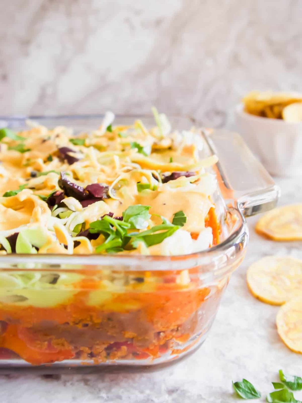 Side angle of lighter taco dip where you can see all the layers.