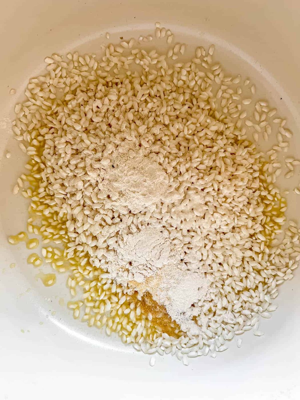 Rice in a pot, at the beginning of making risotto.