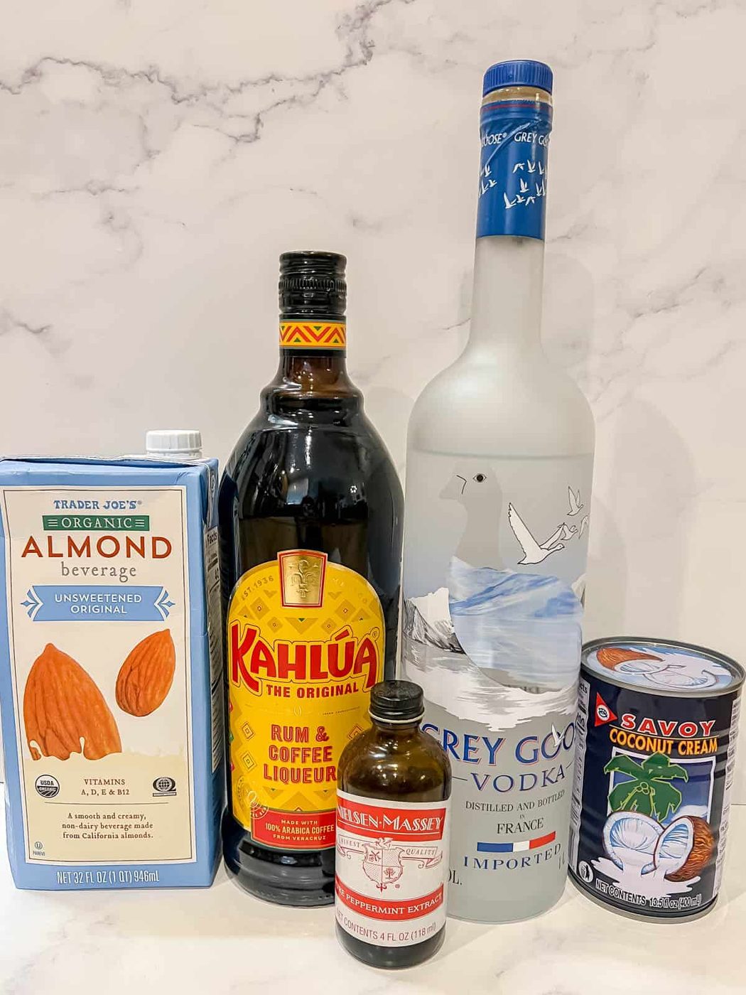 Ingredients needed to make a peppermint dairy free white russian.