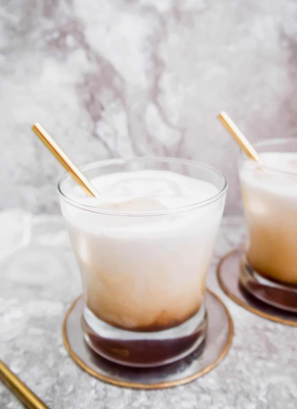 Side angle of white russian drink.