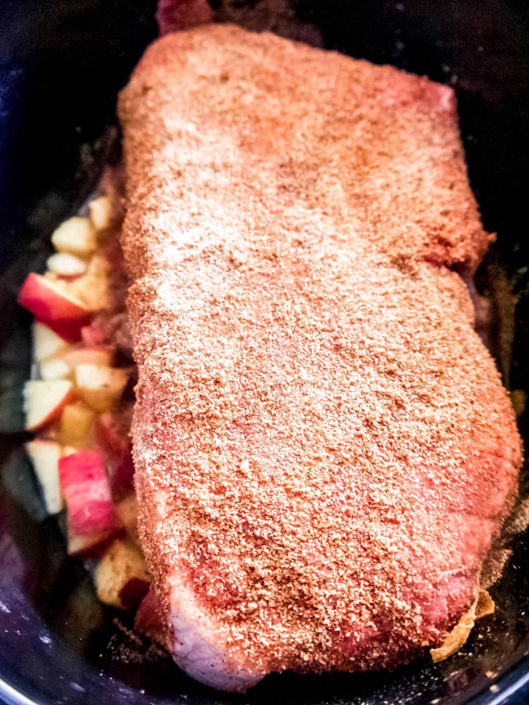 All ingredients in slow cooker before apple pulled pork cooks.
