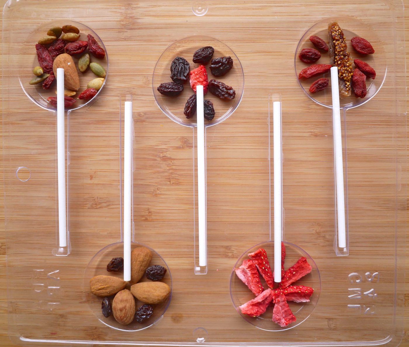 The lollipop sticks added to the molds.
