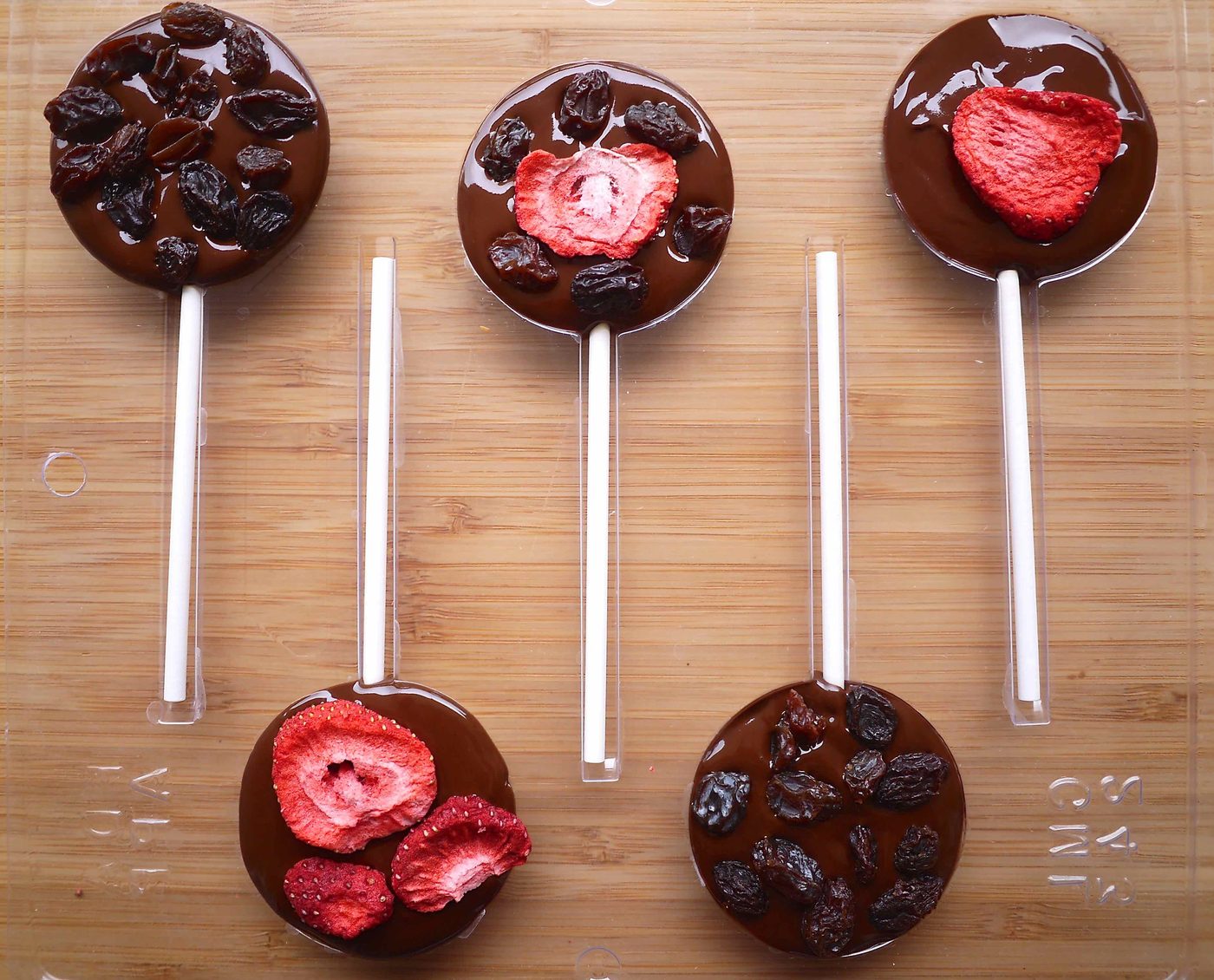 Dried fruit on top of the melted chocolate.