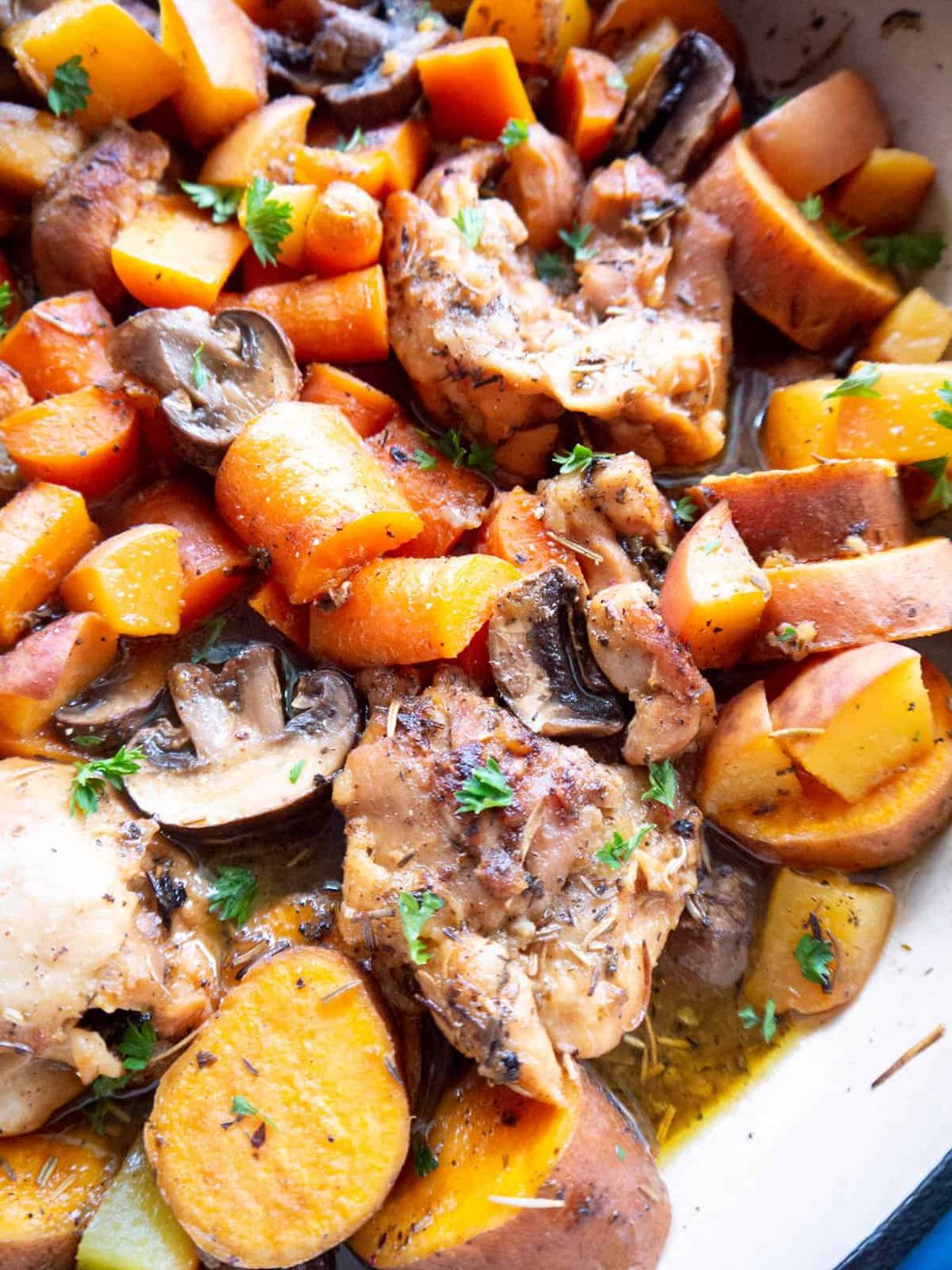 Up close shot of cooked Dutch Oven Maple Peach Chicken Thighs.