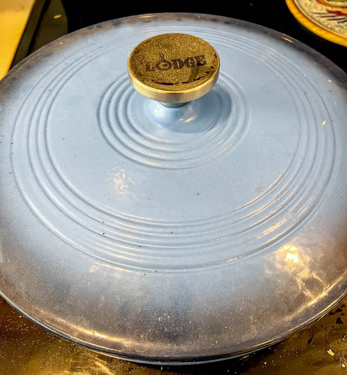 A cover added to the dutch oven.