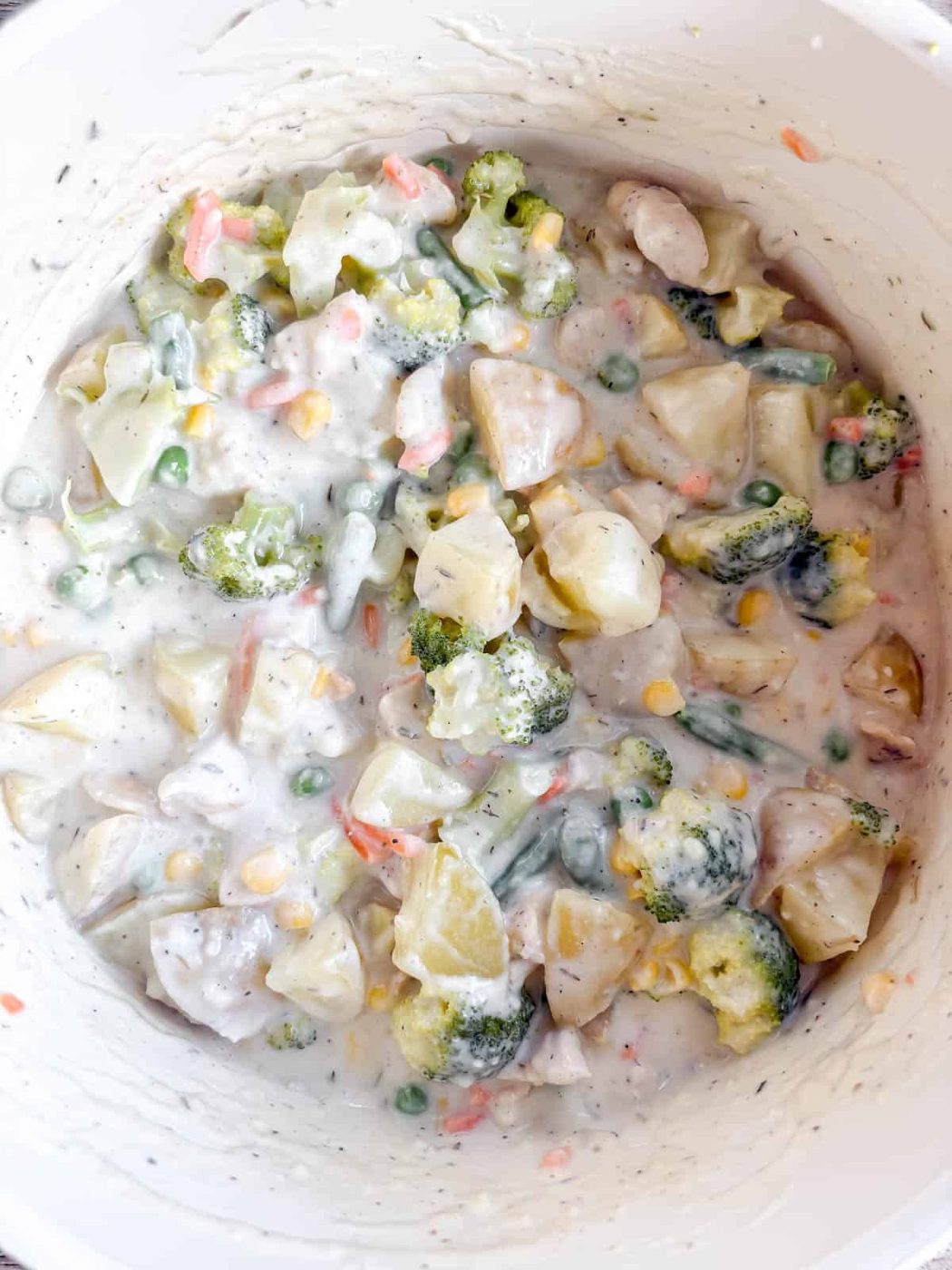 Chicken, frozen veggies, potatoes and broccoli added to the sauce.