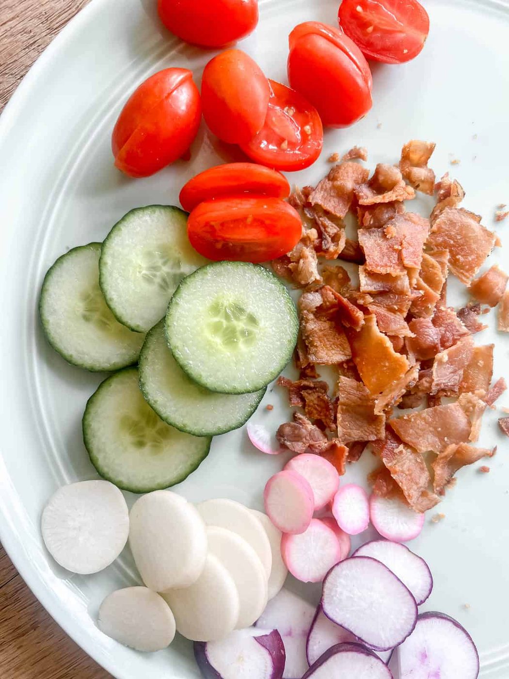 Toppings for egg salad wraps.