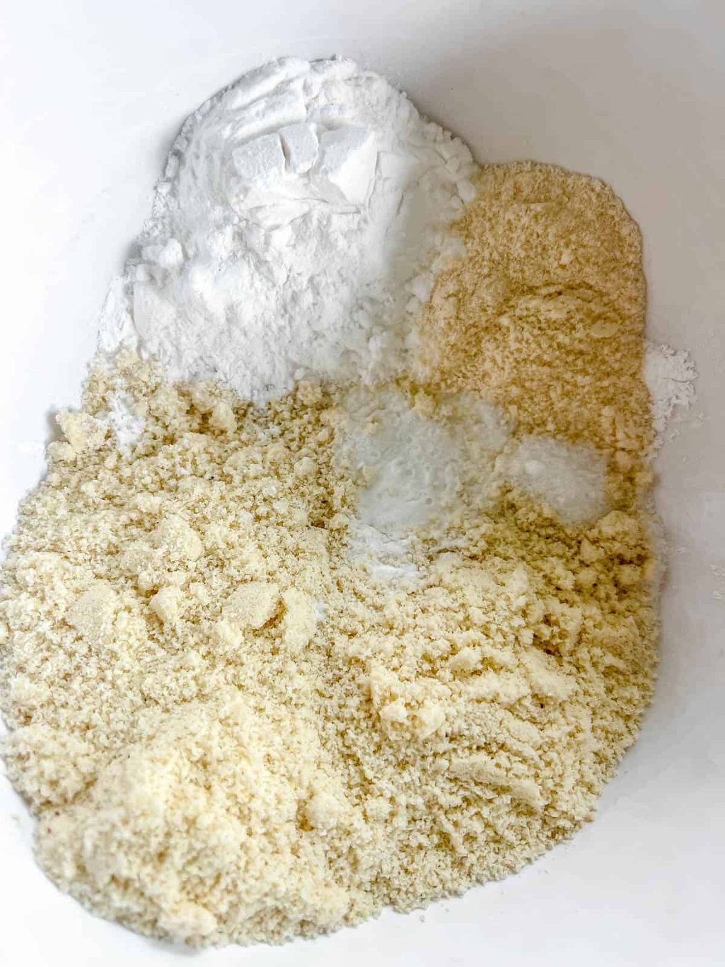 Dry banana bread ingredients in a bowl.