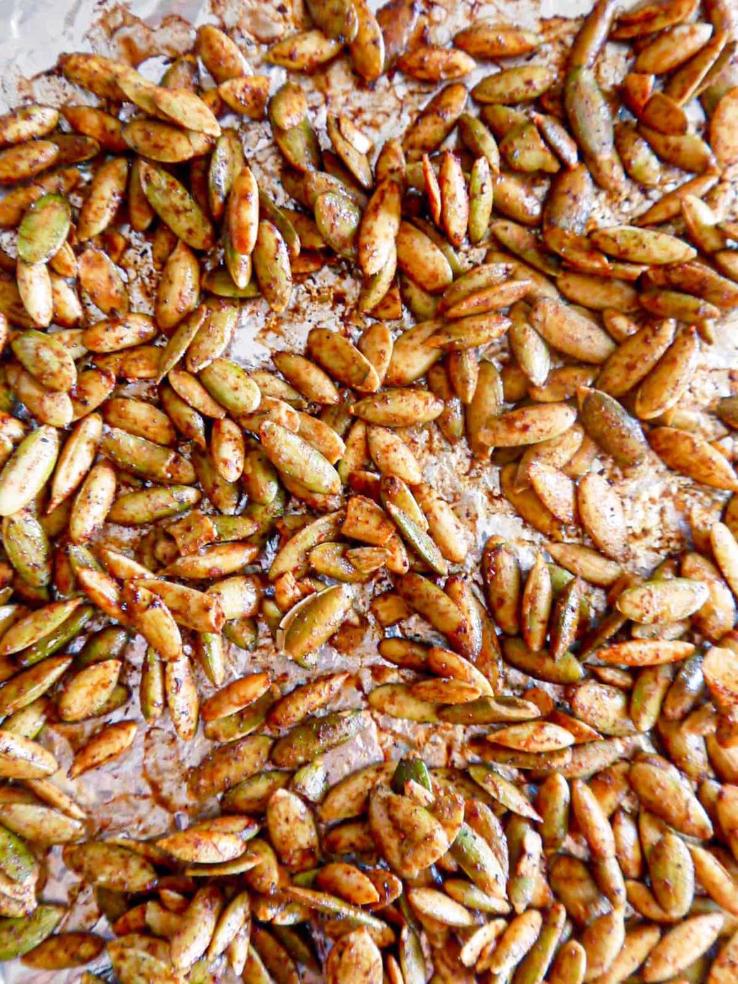 Roasted pepitas in a pan.