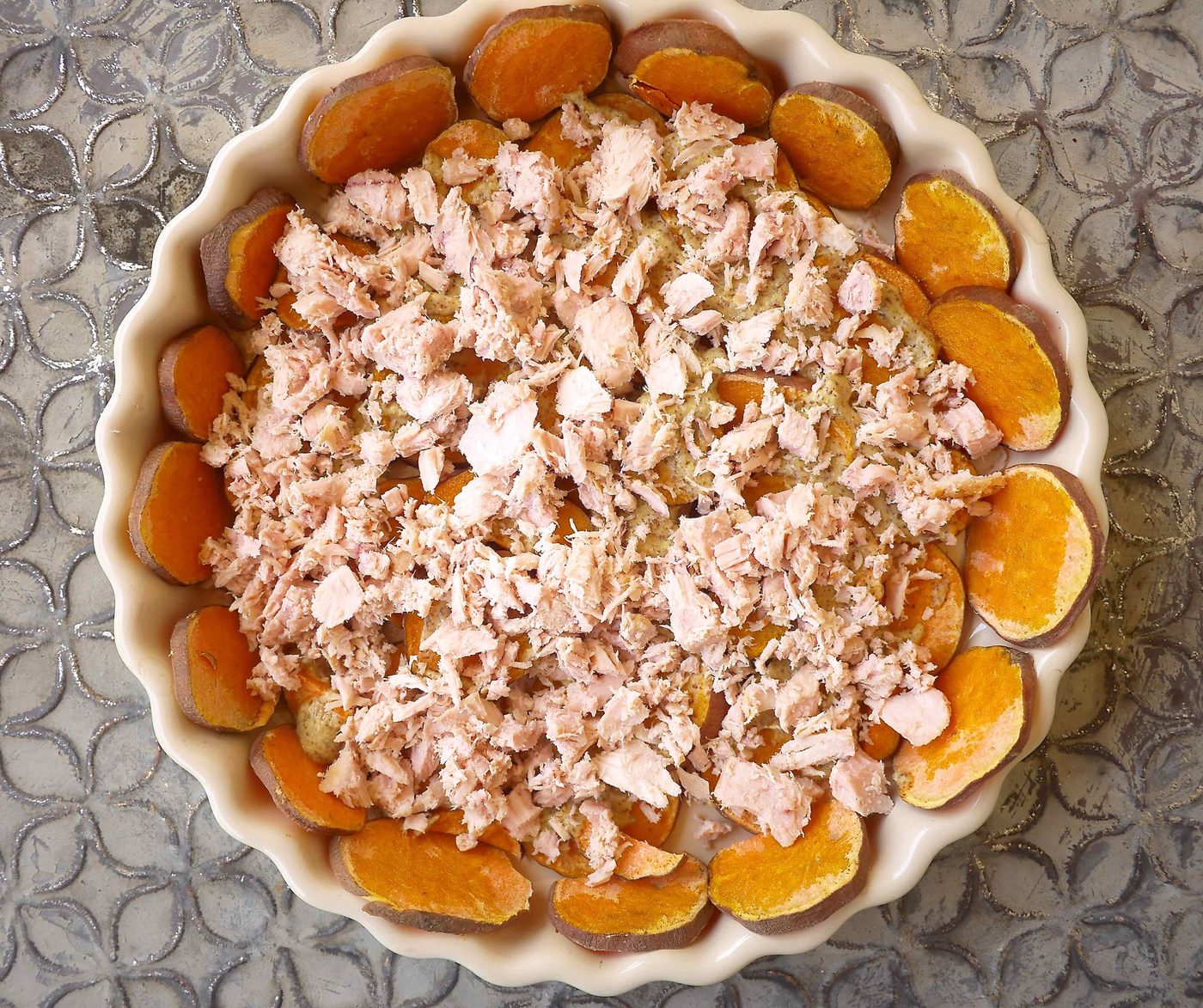 Tuna added to potato crust.
