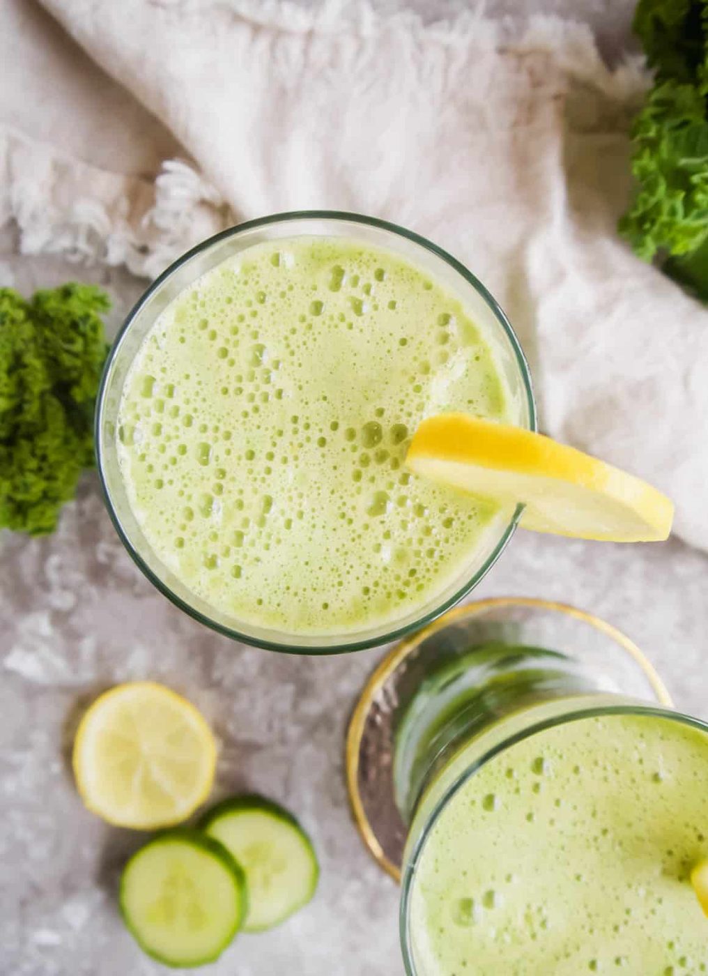 Aerial view of Green Juice with Apple, Kale, Cucumber, Fennel, and Ginger.