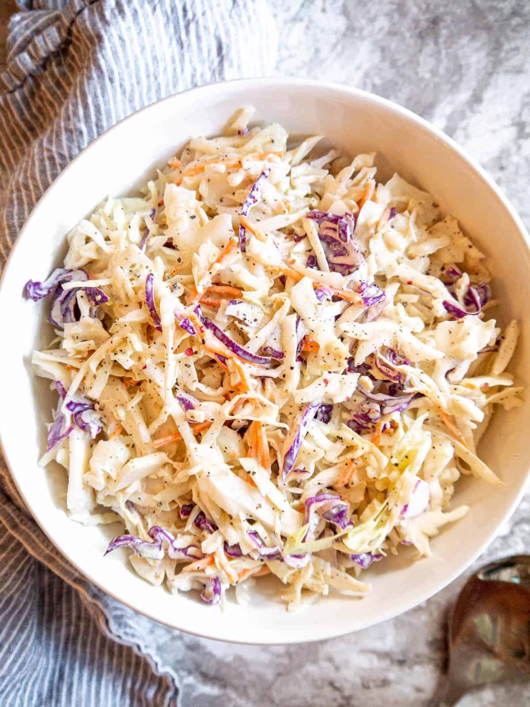 Paleo coleslaw recipe in a bowl.