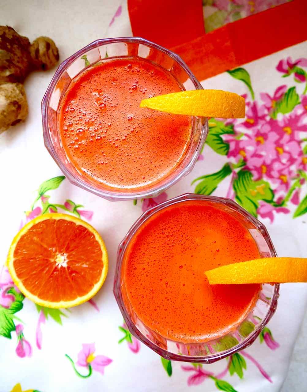 Apple Carrot Beet Ginger Juice in two cups.