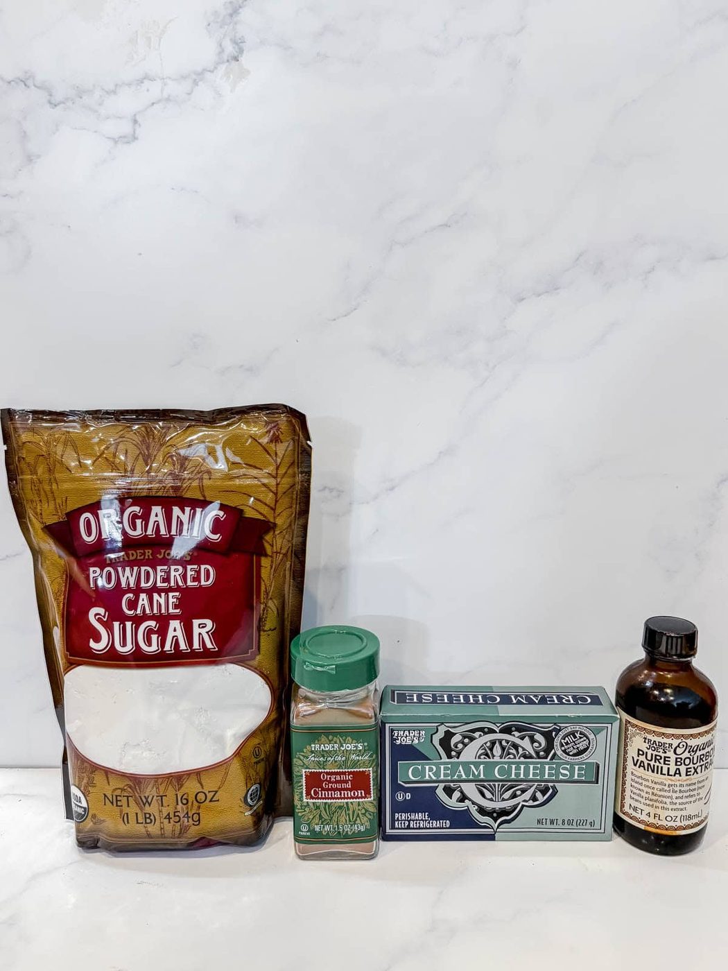 Ingredients needed to make Cinnamon Cream Cheese Frosting.