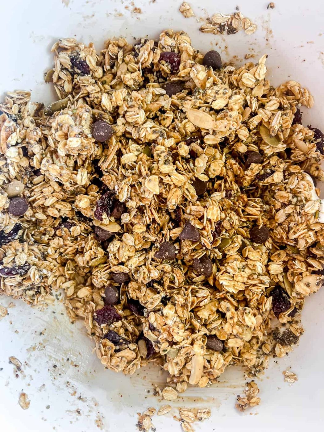 Almond butter mixture mixed into oat mixture.